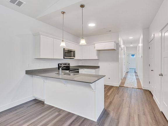 5th image of 1093 N 3980 W #303
