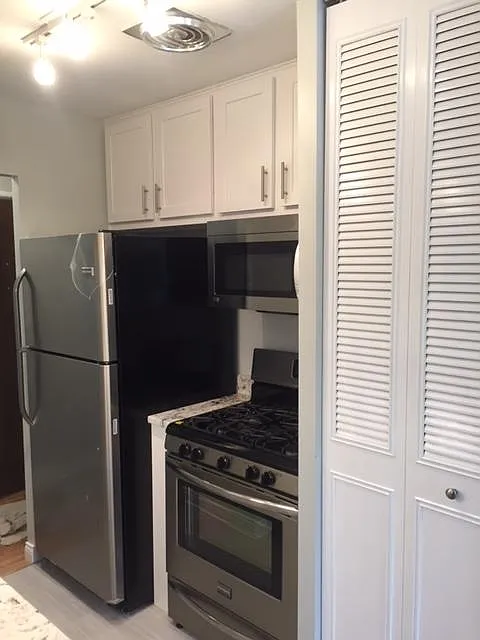 Building Photo - 2629 N Hampden Ct #305