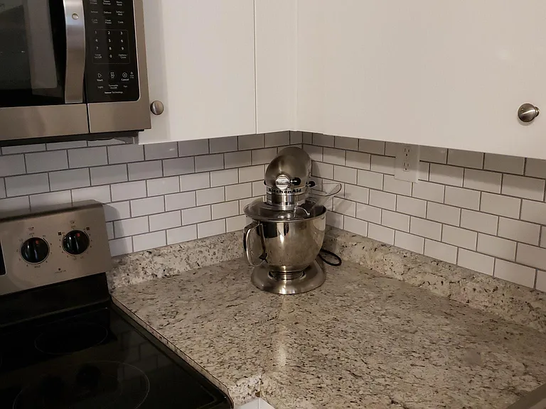 Kitchen Aid mixer does not convey but looks right at home here :)