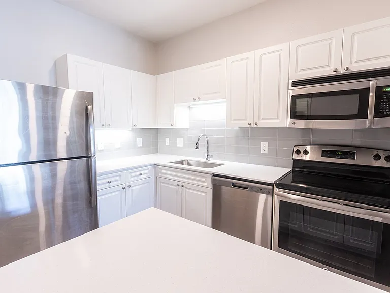 Gourmet kitchens include stainless steel appliances