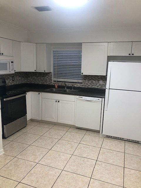 Kitchen with day light on