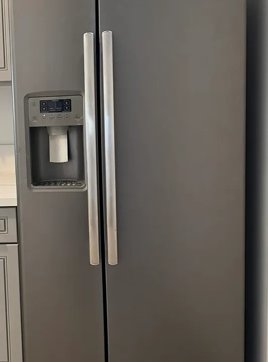 Stainless side-by-side GE refrigerator