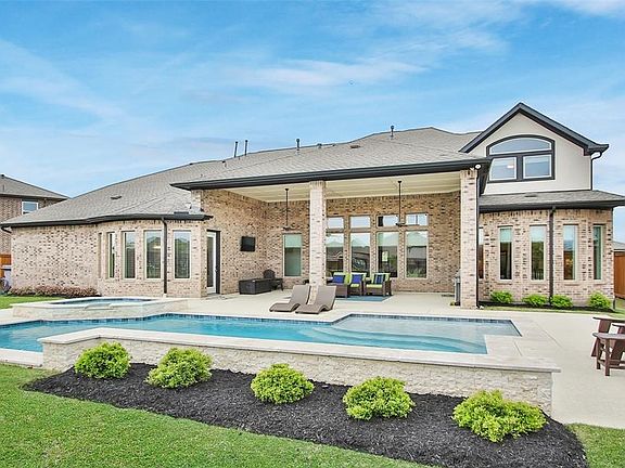 Entertain in this stunning backyard with custom pool/spa added in 2020.