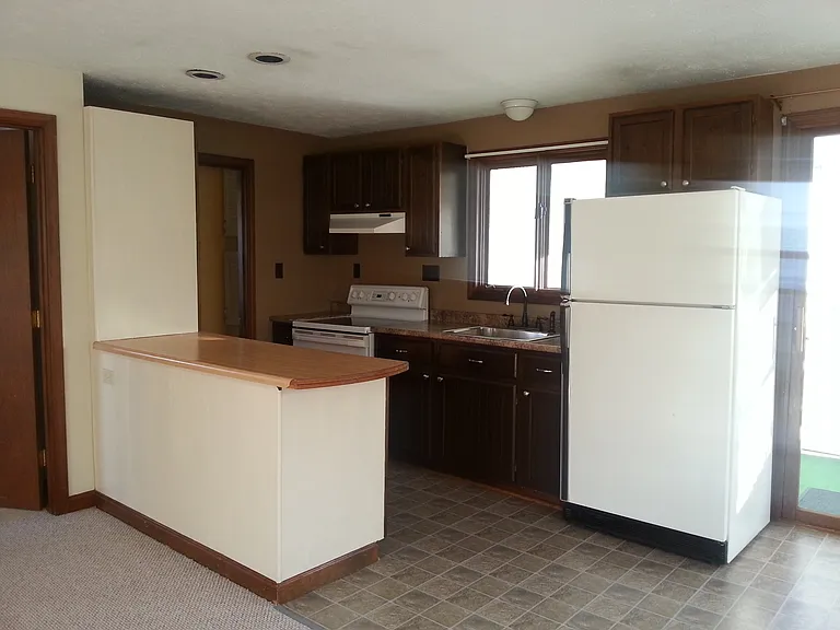 Black smooth top oven now and SS fridge