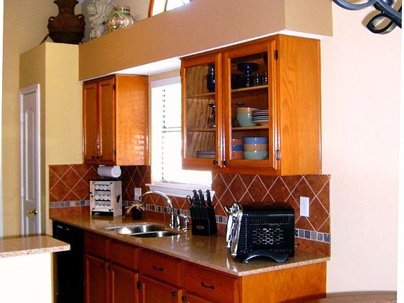 Kitchen Right View, Pantry, Overhead lighted shelf, glass cabinet inserts new