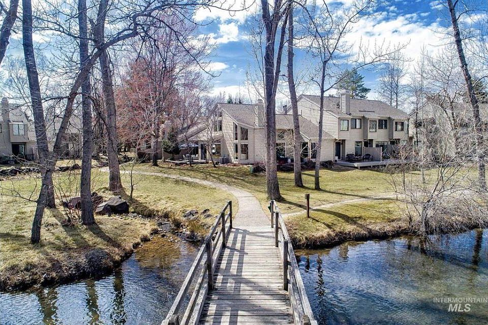 front of property from bridge. Quiet corner unit.