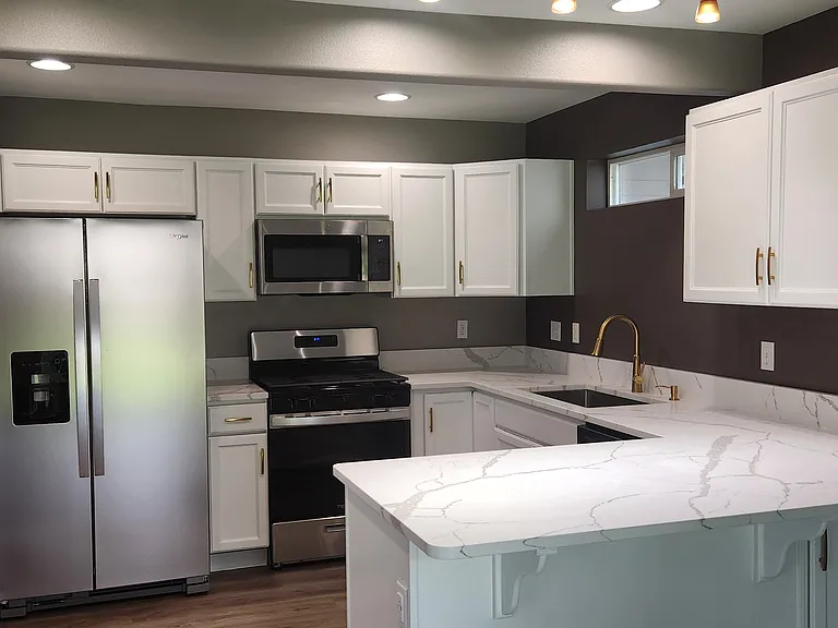 Kitchen with new countertops and appliances 1