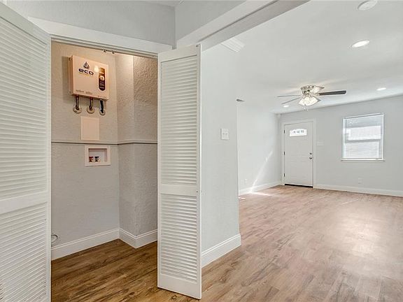 This tankless water heater allows for extra room for laundry, plus more warm water for showers!