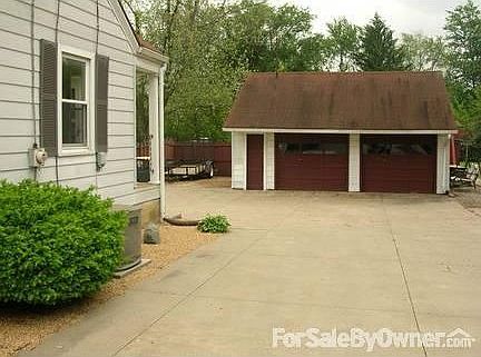 Plenty of concrete for parking or playing basketball.