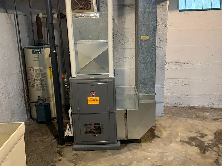 Laundry room and furnace.