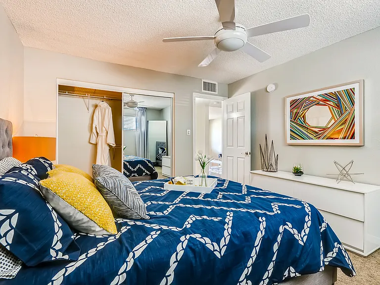 Carpeted Bedroom w/ Ceiling Fan