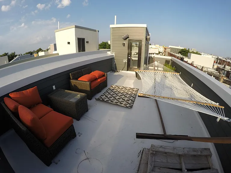 Rooftop with sunset and skyline views