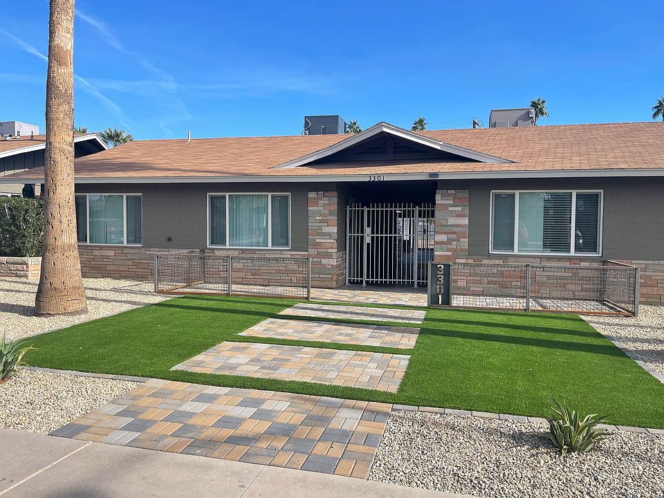 Beautifully landscaped. Unit is interior middle unit