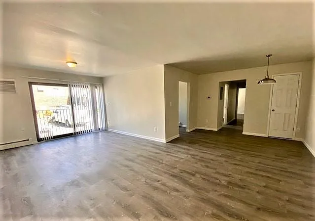 SPRUCE w/updated wood panel flooring