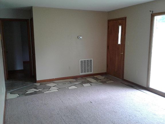 Living room front door.  Marble foyer.