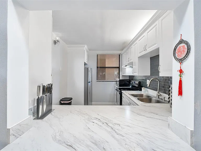 8437 Forest Hills Dr #203 — Photo 2