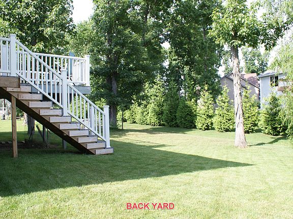 Open back yard, newer deck