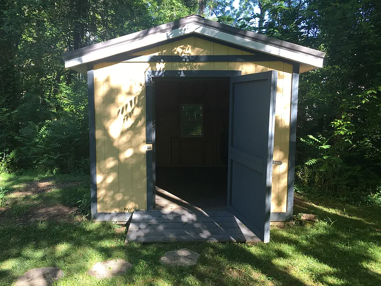 9.5x11.5 with insulated, screened window to the woods