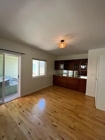 First floor bedroom or office, opens to deck/jacuzzi
