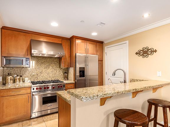Kitchen with eat in breakfast bar