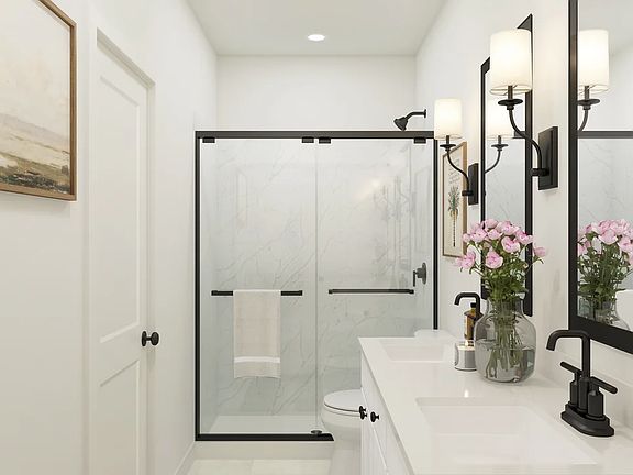 Primary bath with glass shower enclosure