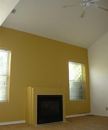 Vaulted ceiling in living room, gas fireplce