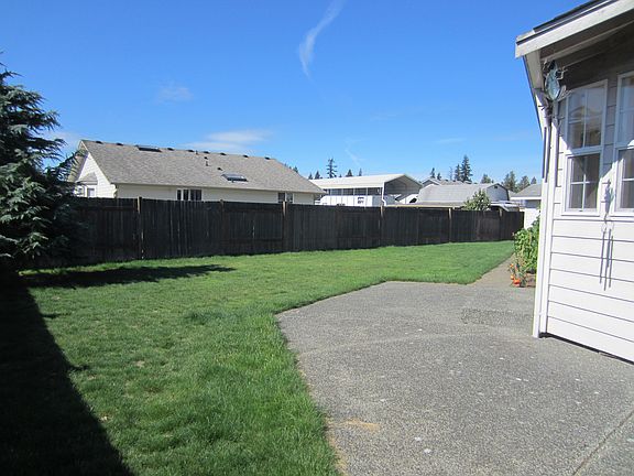 Spacious partially fenced yard