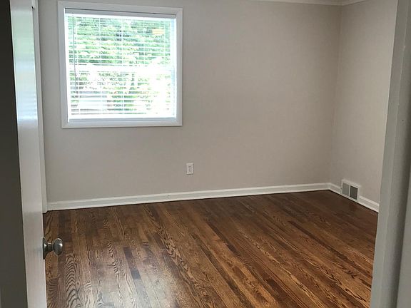 Bedroom 1 with hardwood floors and large closet space!