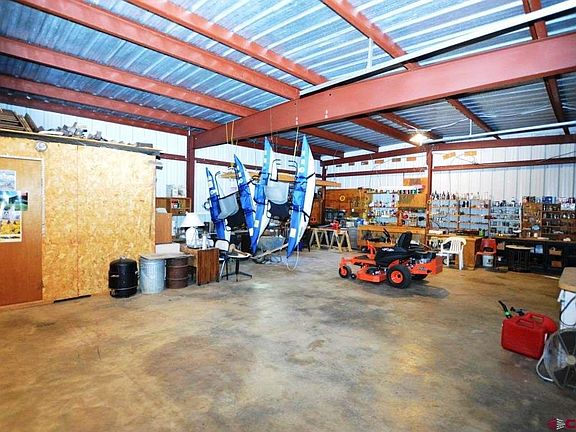 Storage for boats, ATV's, motor cycles and equipment.  work shop. hanging shed.