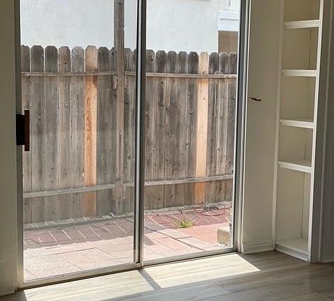 Living Room w/sliding door to side patio