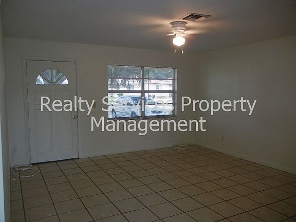 LIVING ROOM AND ENTRY