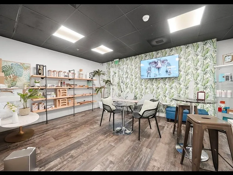 Luxury building's amenities: CAFE & MARKET, great for a croissant or an empanada & a cafecito on your way to work
