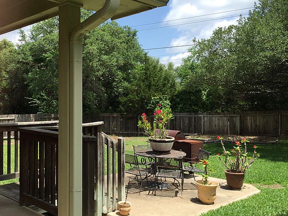 View of back yard and porch from right