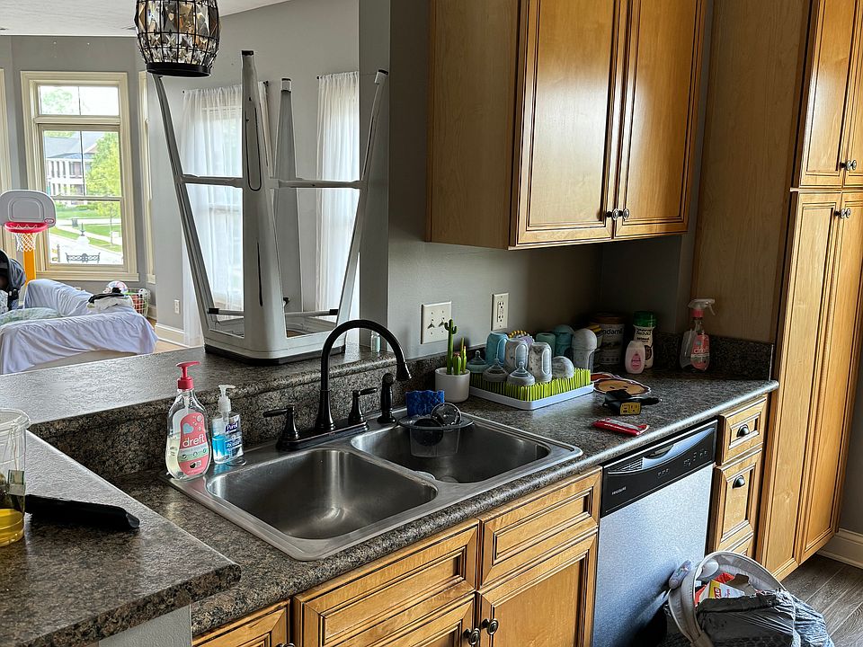 Keep walking you will see full size kitchen with all stainless steel appliances, including dishwasher
