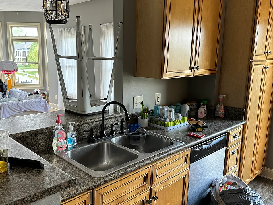 Keep walking you will see full size kitchen with all stainless steel appliances, including dishwasher