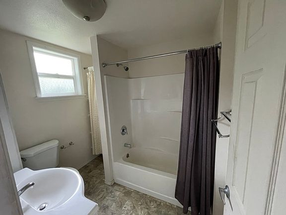 Updated bathroom, view of bathtub/shower