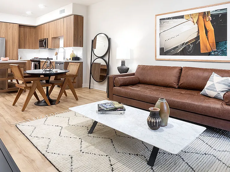 Luxurious homes featuring vinyl wood flooring with chef-inspired kitchens