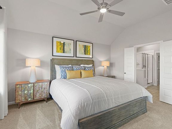 Primary Bedroom in the Diamond home plan by Trophy Signature Homes - REPRESENTATIVE PHOTO