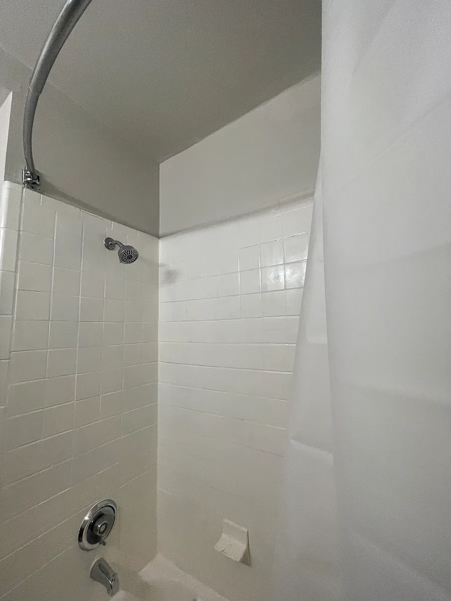 Tiled shower and tub - 224 W Monument St #2R