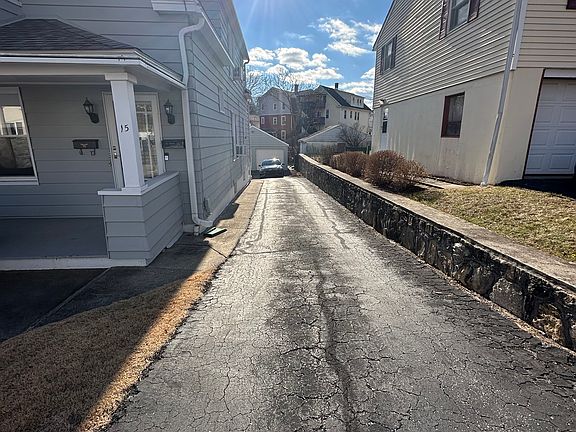 Long private driveway leading to the rear
