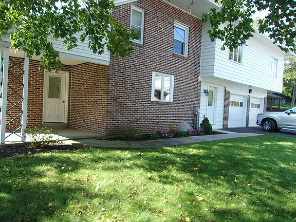 Side of house with 2 car garage