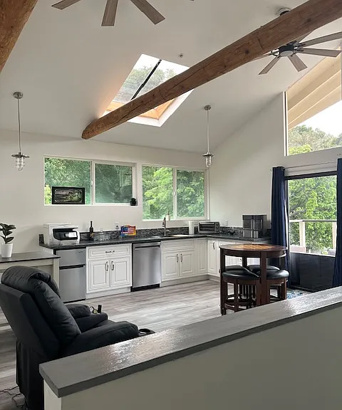upstairs area with outside balcony deck seating.