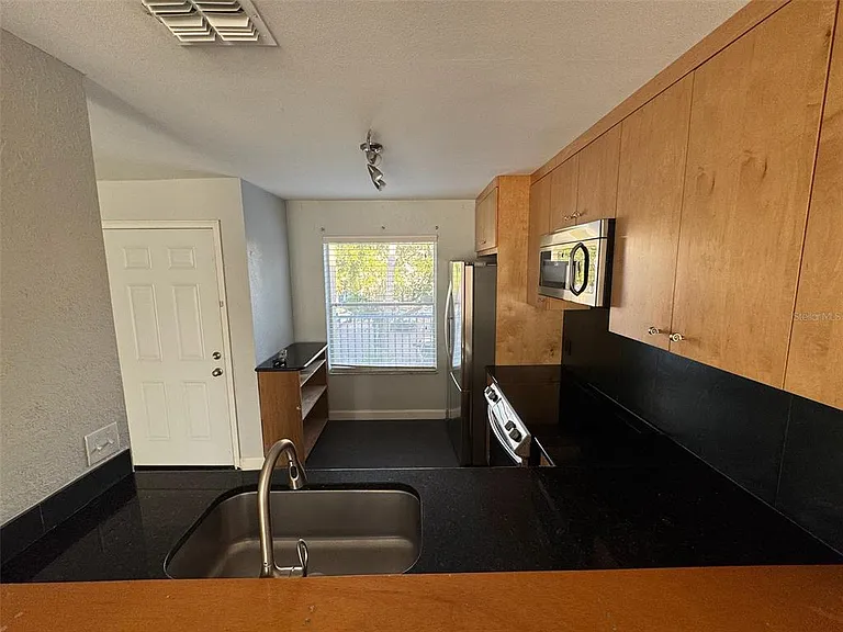 2568 Woodgate Blvd #205 — Photo 3
