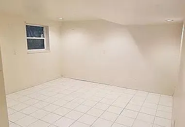 Sixth bedroom (located off of family room - only bedroom in daylight basement).