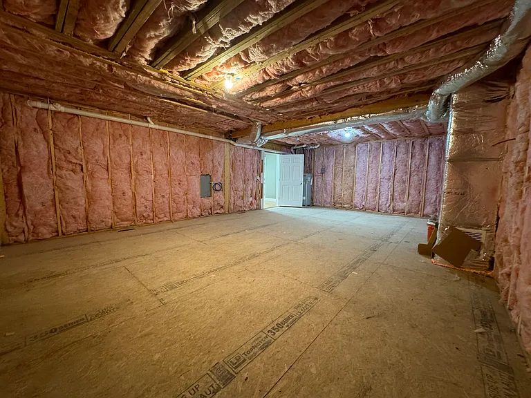 bonus room/mechanical room (behind garage/main entry level)