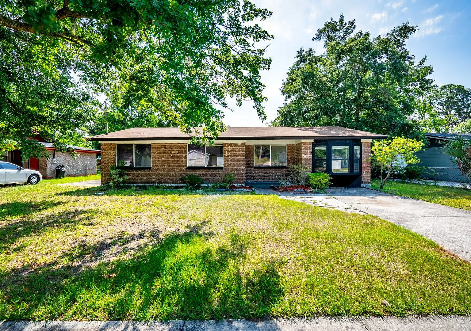 Timuquana 3BR/2BA Solid Brick Home w/ Flex Space & Private Yard — Photo 2