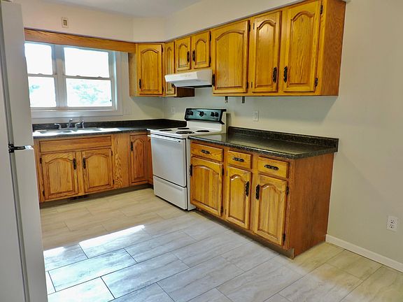 Eat-In Kitchen with new tile flooring.