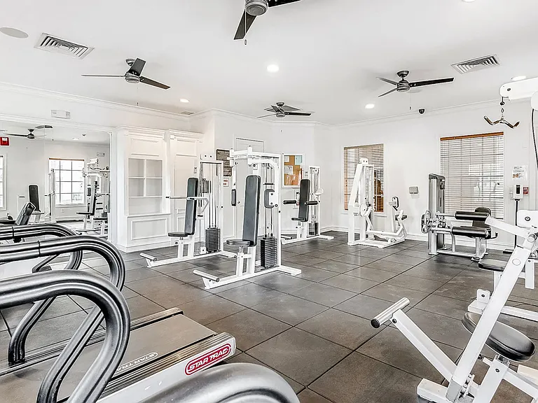 Fully equipped fitness center with cardio and weights
