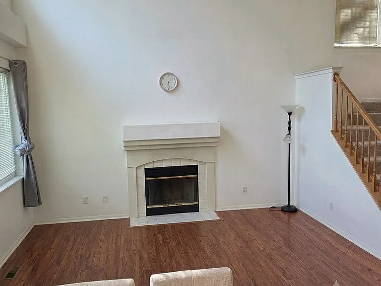 Spacious family room with high vaulted ceilings