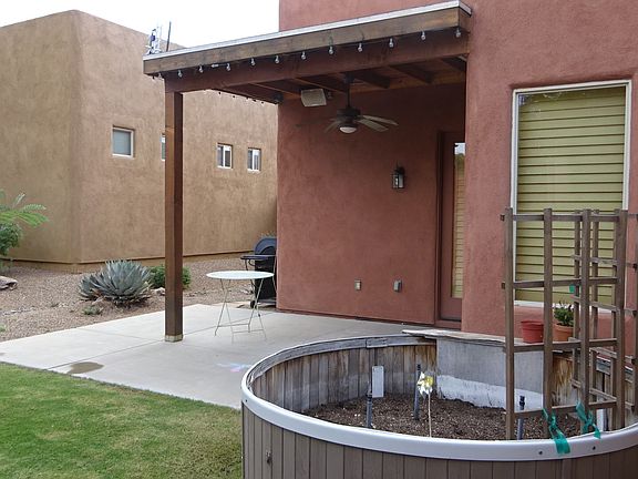 Back yard with converted hot tub garden